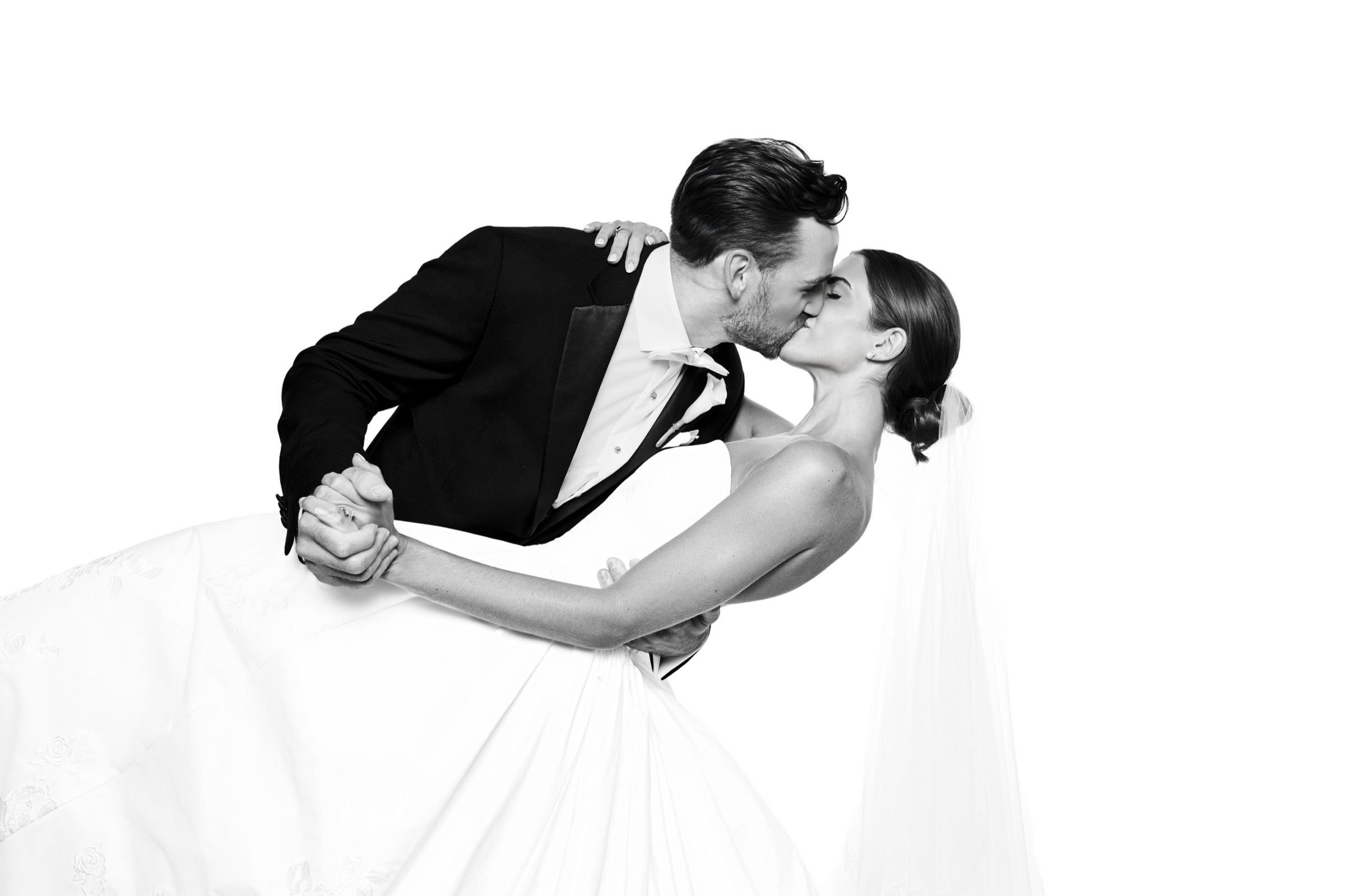 Groom dipping the bride for a kiss, the finished, wall-worthy portrait